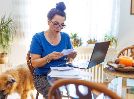 Woman looking at a laptop